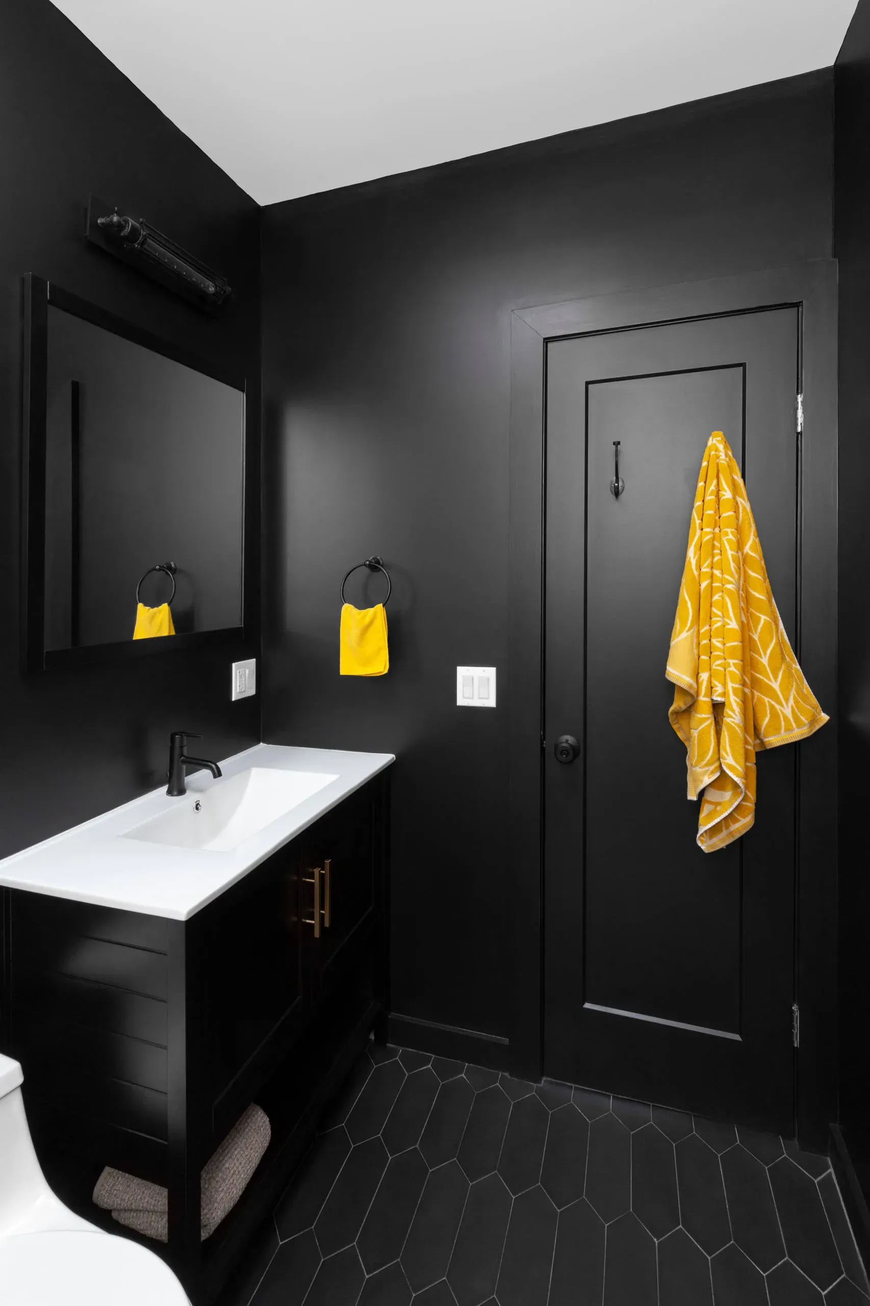 Lighting is Key for Your Black Accent Wall Bathroom